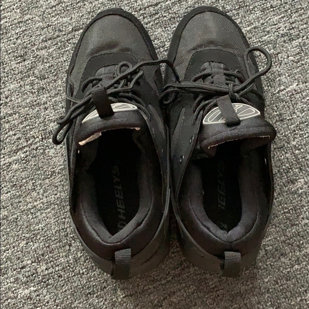 Black Heelys! New & never worn.